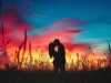 ai-generated-a-couple-s-passionate-kiss-under-a-vibrant-sunset-love-igniting-in-the-twilight-free-photo-565×318